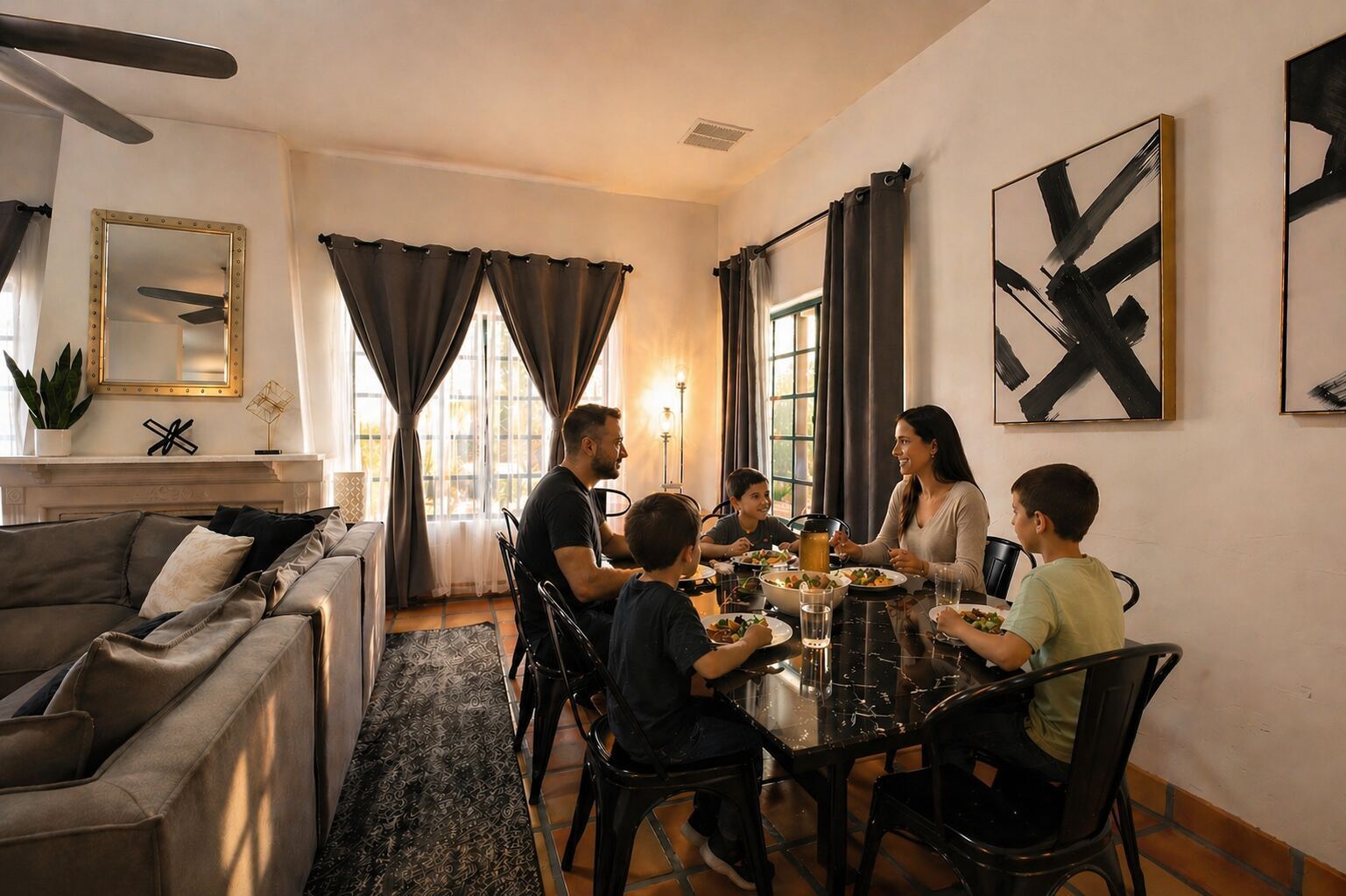 The long dining table and open kitchen at Moonlight Oasis, set up for a family reunion dinner