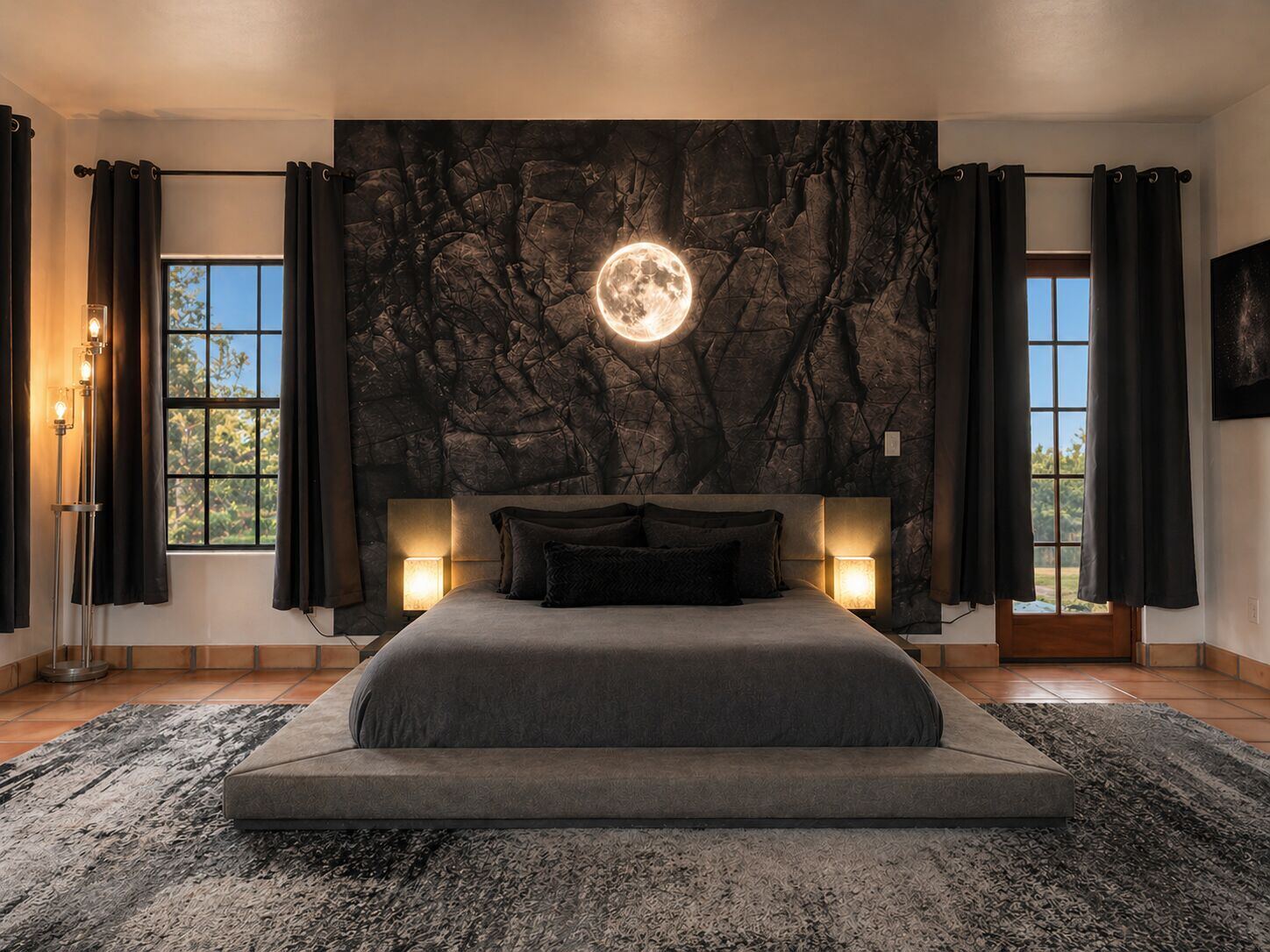 The Moon Room — primary king bedroom with hand-painted moon mural