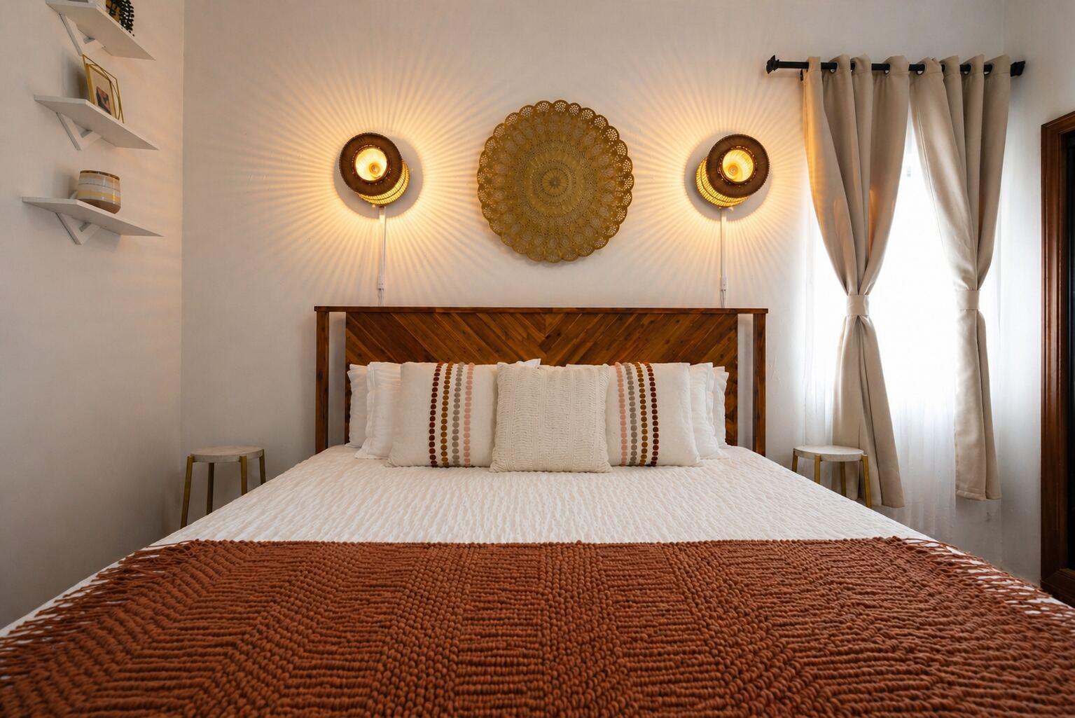 The Sunrise Room — king bedroom with warm terracotta plaster walls